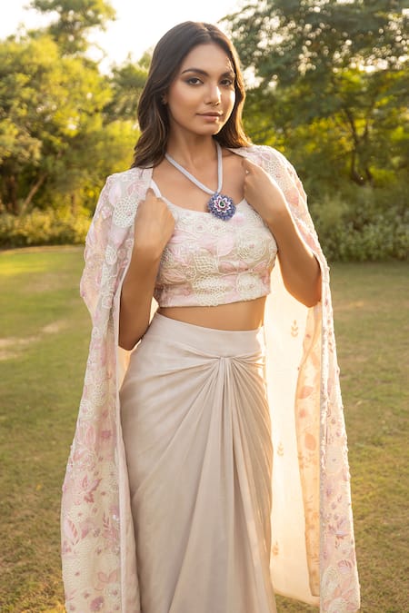 Shop Islie By Priya Jain Beige Tissue, Kota Doria Beads, Sequins Embellished Floral Cape Draped Skirt Set at Aza Fashions Shop_Islie By Priya Jain_Beige Tissue, Kota Doria Beads, Sequins Embellished Floral Cape Draped Skirt Set _at_Aza_Fashions