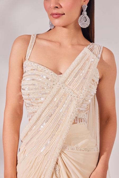 Chaashni By Maansi And Ketan_Ivory Net, Satin, Georgette, Organza And Cutdana Pre-draped Saree With Blouse _at_Aza_Fashions