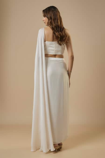 Shop_Ewoke_White Georgette, Satin Solid Asymmetric Pre-draped Saree With Embellished Blouse _at_Aza_Fashions