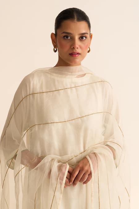 Shop_Dot_Ivory Cotton, Silk Embroidery, Tassels Round Neck Firoz Plain Kurta Pant Set _Online_at_Aza_Fashions