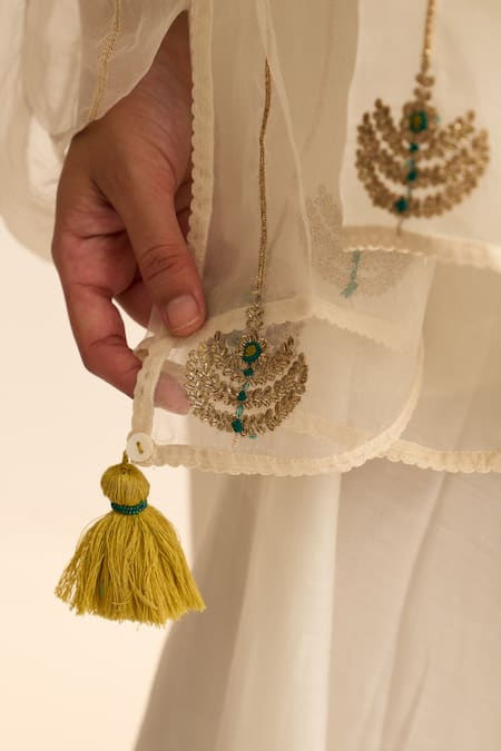 Dot_Ivory Cotton, Silk Embroidery, Tassels Round Neck Firoz Plain Kurta Pant Set _at_Aza_Fashions