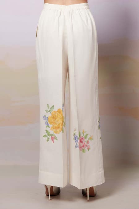 Shop Moh India Ivory Linen Embroidery Cross-stitch Rose Summer Trouser at Aza Fashions Shop_Moh India_Ivory Linen Embroidery Cross-stitch Rose Summer Trouser _at_Aza_Fashions