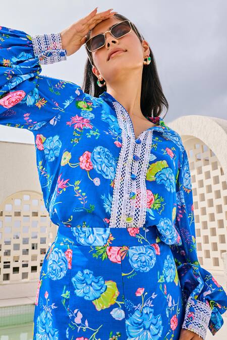 House Of Zeniaa Blue Cotton, Muslin Lace Collared Iris Bloom Print Top Online at Aza Fashions House Of Zeniaa_Blue Cotton, Muslin Lace Collared Iris Bloom Print Top_Online_at_Aza_Fashions