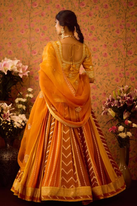 Shyam Narayan Prasad Yellow Organza, Viscose, Yam Floral Brocade Tunic And Lehenga Set Online at Aza Fashions Shyam Narayan Prasad_Yellow Organza, Viscose, Yam Floral Brocade Tunic And Lehenga Set _Online_at_Aza_Fashions