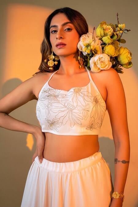 Shop Amrood Off White Satin Embroidery Halter Neck Lily Bloom Lehenga With Blouse Online at Aza Fashions Shop_Amrood_Off White Satin Embroidery Halter Neck Lily Bloom Lehenga With Blouse _Online_at_Aza_Fashions