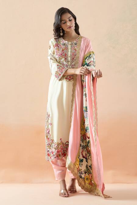 Debyani + CO Ivory Cotton Embroidery, Zari, Sequins Round Neck Floral Kurta Dhoti Pant Set at Aza Fashions Debyani + CO_Ivory Cotton Embroidery, Zari, Sequins Round Neck Floral Kurta Dhoti Pant Set _at_Aza_Fashions