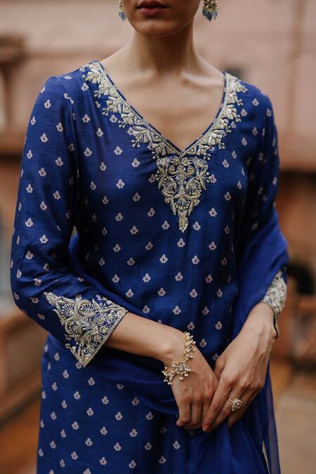 Megha Pitti Blue Silk, Denim Embroidery, Sequins, Lace Floral Print Short Kurta Sharara Set at Aza Fashions Megha Pitti_Blue Silk, Denim Embroidery, Sequins, Lace Floral Print Short Kurta Sharara Set _at_Aza_Fashions