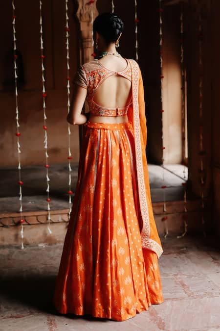 Shop_Megha Pitti_Orange Silk Lace, Sequins Sweetheart Neck Bloom Print Lehenga Set _at_Aza_Fashions