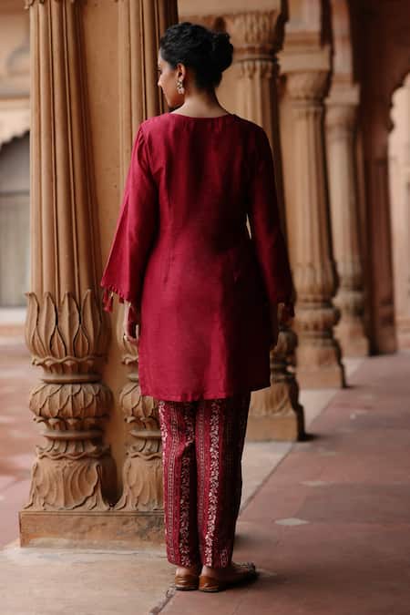 Shop Megha Pitti Magenta Silk Tassels, Sequins Split Bloom Embroidered Yoke Kurta With Pant at Aza Fashions Shop_Megha Pitti_Magenta Silk Tassels, Sequins Split Bloom Embroidered Yoke Kurta With Pant _at_Aza_Fashions