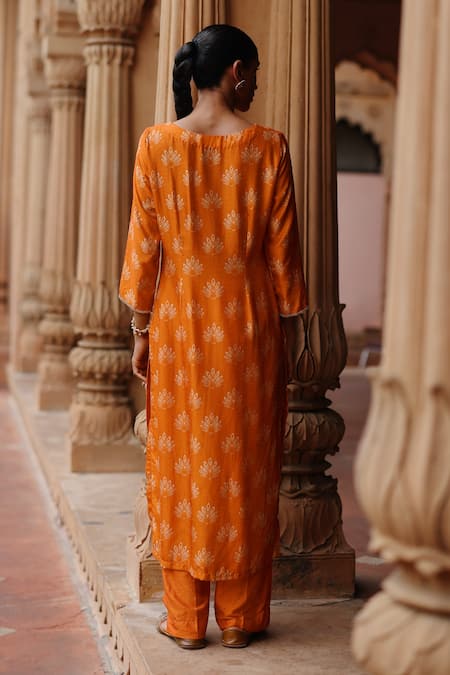 Shop Megha Pitti Orange Silk Embroidery, Sequins Boat Lotus Motif Embellished Kurta With Pant at Aza Fashions Shop_Megha Pitti_Orange Silk Embroidery, Sequins Boat Lotus Motif Embellished Kurta With Pant _at_Aza_Fashions
