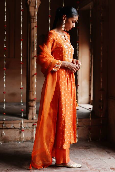 Megha Pitti Orange Silk, Organza Embroidery, Sequins Clover Bloom Print Yoke Kurta Pant Set Online at Aza Fashions Megha Pitti_Orange Silk, Organza Embroidery, Sequins Clover Bloom Print Yoke Kurta Pant Set _Online_at_Aza_Fashions