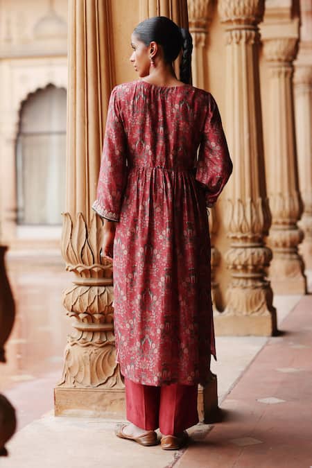 Shop Megha Pitti Red Silk Sequins V-neck Midnight Blossom Print Aliya Cut Kurta With Pant at Aza Fashions Shop_Megha Pitti_Red Silk Sequins V-neck Midnight Blossom Print Aliya Cut Kurta With Pant _at_Aza_Fashions