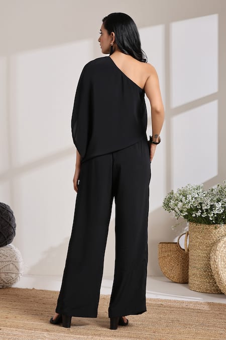 Shop_Vasstram_Black Crepe One Shoulder Solid Draped Jumpsuit _at_Aza_Fashions