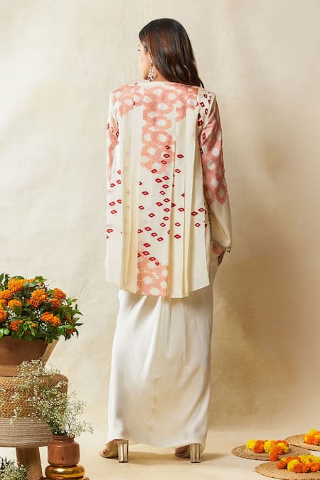 Shop Vedika M Cream Silk, Satin Sequins, Lace Bandhani Print Asymmetric Cape Draped Skirt Set at Aza Fashions Shop_Vedika M_Cream Silk, Satin Sequins, Lace Bandhani Print Asymmetric Cape Draped Skirt Set _at_Aza_Fashions