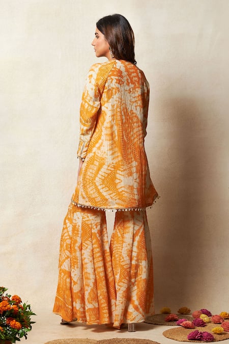 Shop Vedika M Orange Tissue, Silk Embroidery, Zari Abstract Bandhani Print Kurta And Sharara Set at Aza Fashions Shop_Vedika M_Orange Tissue, Silk Embroidery, Zari Abstract Bandhani Print Kurta And Sharara Set _at_Aza_Fashions