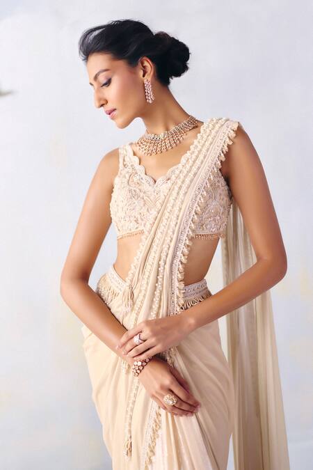 Buy Awigna Ivory Chiffon, Emma Meadow Embroidered Border Pre-draped Saree With Blouse Online at Aza Fashions Buy_Awigna_Ivory Chiffon, Emma Meadow Embroidered Border Pre-draped Saree With Blouse _Online_at_Aza_Fashions