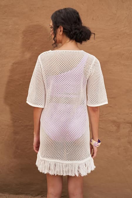 Shop Shop Nirvanaa White Cotton Fringe Round Neck Amaya Knit Short Dress at Aza Fashions Shop_Shop Nirvanaa_White Cotton Fringe Round Neck Amaya Knit Short Dress _at_Aza_Fashions