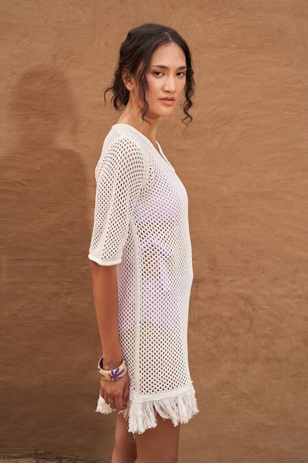 Shop Nirvanaa White Cotton Fringe Round Neck Amaya Knit Short Dress Online at Aza Fashions Shop Nirvanaa_White Cotton Fringe Round Neck Amaya Knit Short Dress _Online_at_Aza_Fashions