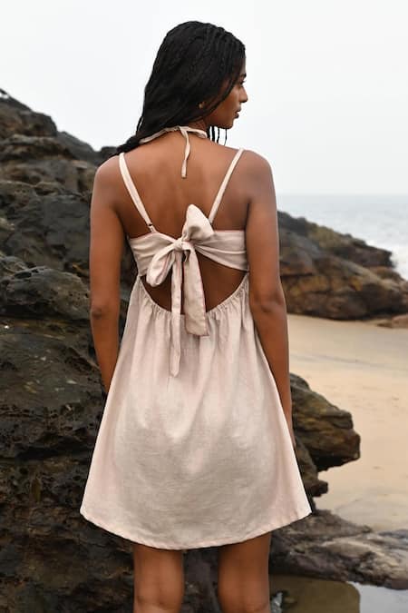 Shop Shop Nirvanaa Beige Linen Embroidery Round Neck Zoe Tie-up Dress at Aza Fashions Shop_Shop Nirvanaa_Beige Linen Embroidery Round Neck Zoe Tie-up Dress _at_Aza_Fashions