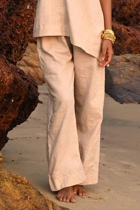 Buy Shop Nirvanaa Beige Linen Eri Flared Pant Online at Aza Fashions Buy_Shop Nirvanaa_Beige Linen Eri Flared Pant _Online_at_Aza_Fashions