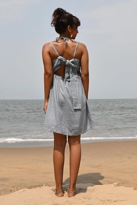 Shop Shop Nirvanaa Blue Linen Embroidery Round Neck Zoe Tie-up Mini Dress at Aza Fashions Shop_Shop Nirvanaa_Blue Linen Embroidery Round Neck Zoe Tie-up Mini Dress _at_Aza_Fashions