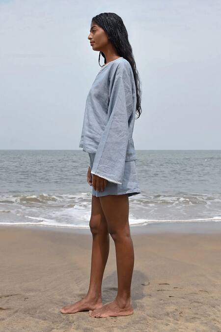 Shop Nirvanaa_Blue Linen Embroidery Round Neck Arlo Flared Sleeve Top _Online_at_Aza_Fashions