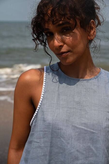 Buy_Shop Nirvanaa_Blue Linen Embroidery Round Neck Lauren Asymmetrical Flared Top _Online_at_Aza_Fashions