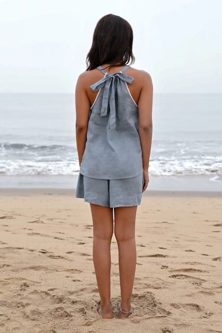 Shop Shop Nirvanaa Blue Linen Embroidery Halter Neck Noir Tie-up Top at Aza Fashions Shop_Shop Nirvanaa_Blue Linen Embroidery Halter Neck Noir Tie-up Top _at_Aza_Fashions