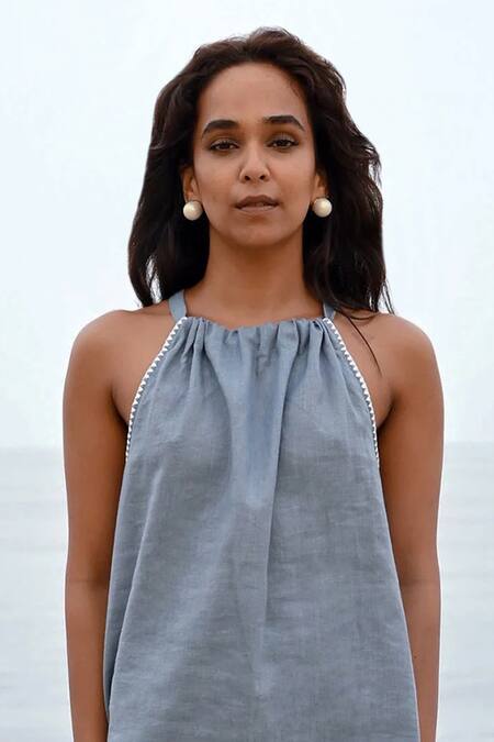 Shop Nirvanaa Blue Linen Embroidery Halter Neck Noir Tie-up Top Online at Aza Fashions Shop Nirvanaa_Blue Linen Embroidery Halter Neck Noir Tie-up Top _Online_at_Aza_Fashions