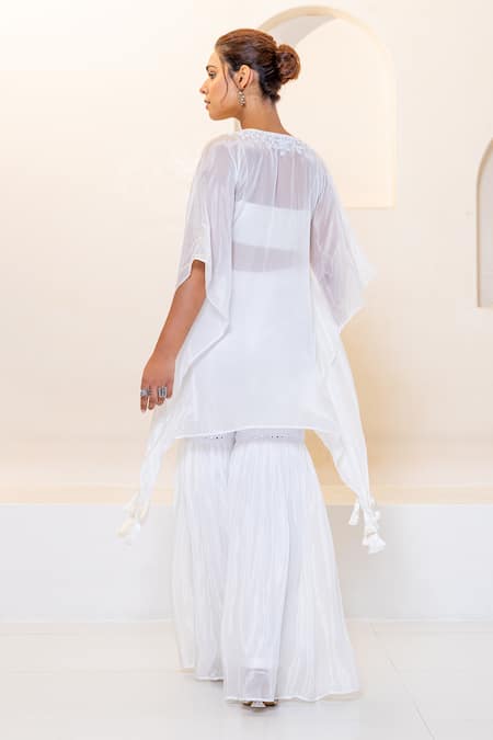 Shop Shruti Sancheti White Hemp, Silk Tassels, Mirrors, Embroidery V-neck, Kaftan Sharara Set at Aza Fashions Shop_Shruti Sancheti_White Hemp, Silk Tassels, Mirrors, Embroidery V-neck, Kaftan Sharara Set _at_Aza_Fashions