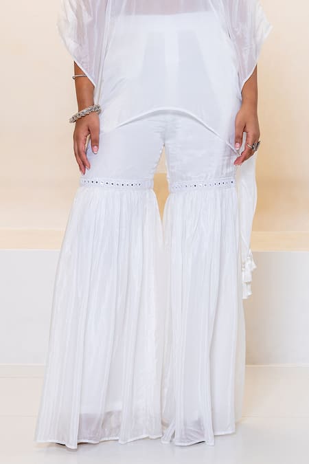 Shruti Sancheti White Hemp, Silk Tassels, Mirrors, Embroidery V-neck, Kaftan Sharara Set Online at Aza Fashions Shruti Sancheti_White Hemp, Silk Tassels, Mirrors, Embroidery V-neck, Kaftan Sharara Set _Online_at_Aza_Fashions