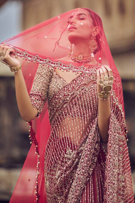 Nitika Gujral_Maroon Net Sequins, Diamonds V-neck Antique Kasab Embroidered Saree And Blouse Set _at_Aza_Fashions