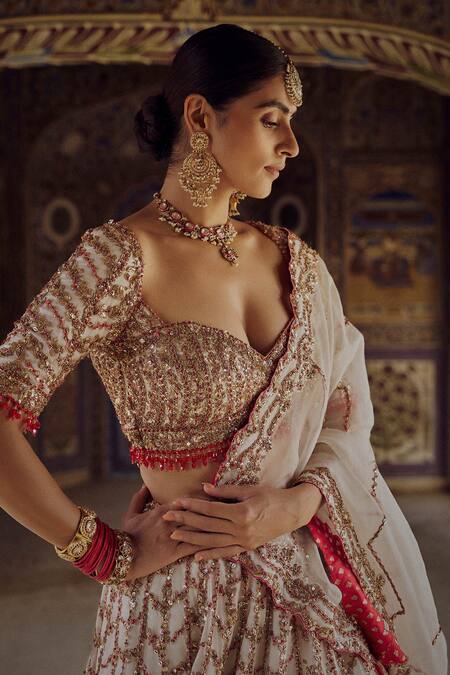 Nitika Gujral Ivory Organza, Georgette Sequins, Chevron Embroidered Bridal Lehenga Blouse Set at Aza Fashions Nitika Gujral_Ivory Organza, Georgette Sequins, Chevron Embroidered Bridal Lehenga Blouse Set _at_Aza_Fashions
