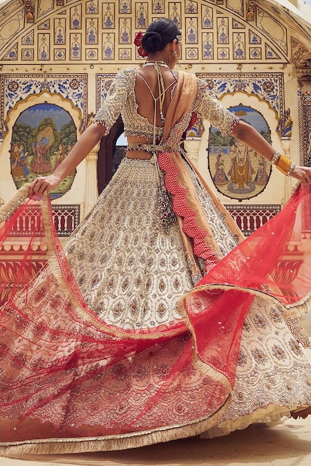 Shop Nitika Gujral Gold Net, Tissue Crystals, Pearls, Beads Resham Embroidered Bridal Lehenga Set at Aza Fashions Shop_Nitika Gujral_Gold Net, Tissue Crystals, Pearls, Beads Resham Embroidered Bridal Lehenga Set _at_Aza_Fashions