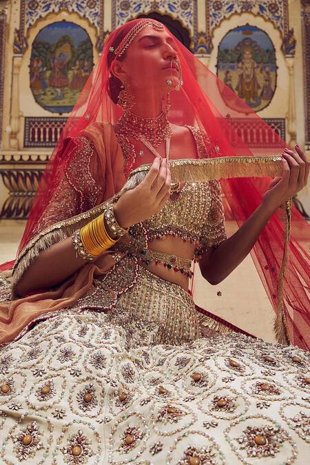 Nitika Gujral Gold Net, Tissue Crystals, Pearls, Beads Resham Embroidered Bridal Lehenga Set Online at Aza Fashions Nitika Gujral_Gold Net, Tissue Crystals, Pearls, Beads Resham Embroidered Bridal Lehenga Set _Online_at_Aza_Fashions