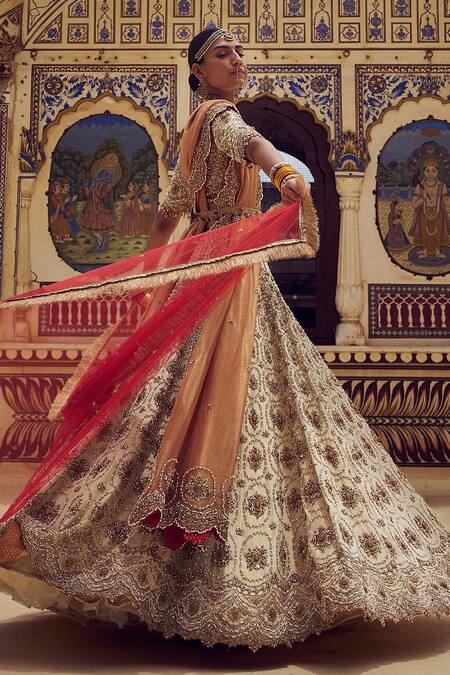 Shop Nitika Gujral Gold Net, Tissue Crystals, Pearls, Beads Resham Embroidered Bridal Lehenga Set Online at Aza Fashions Shop_Nitika Gujral_Gold Net, Tissue Crystals, Pearls, Beads Resham Embroidered Bridal Lehenga Set _Online_at_Aza_Fashions