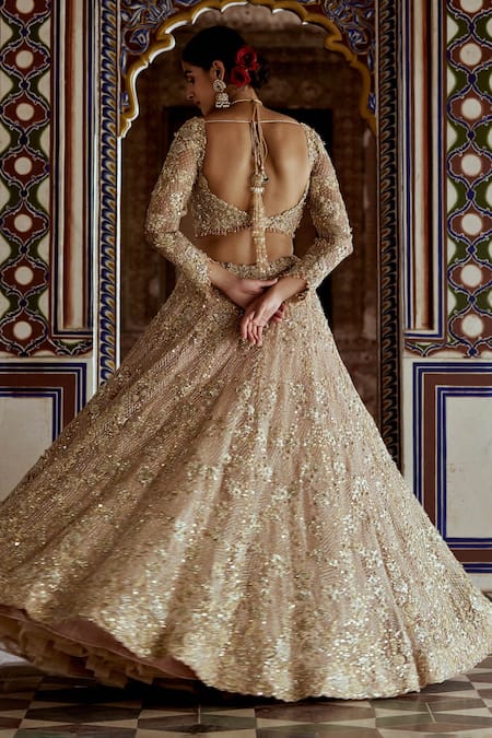 Shop Nitika Gujral Gold Satin, Net Sequins, Rosette Vine Zari Embroidered Bridal Lehenga Set at Aza Fashions Shop_Nitika Gujral_Gold Satin, Net Sequins, Rosette Vine Zari Embroidered Bridal Lehenga Set _at_Aza_Fashions