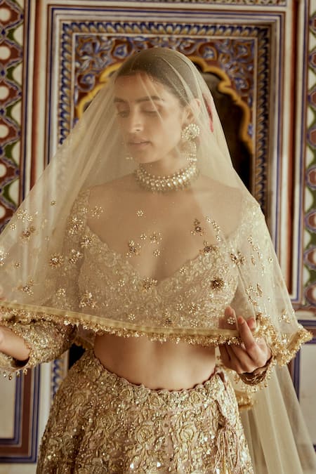 Shop Nitika Gujral Gold Satin, Net Sequins, Rosette Vine Zari Embroidered Bridal Lehenga Set Online at Aza Fashions Shop_Nitika Gujral_Gold Satin, Net Sequins, Rosette Vine Zari Embroidered Bridal Lehenga Set _Online_at_Aza_Fashions