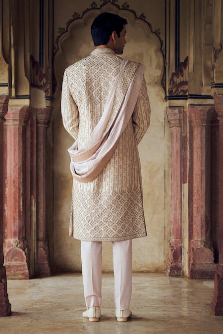 Shop Nitika Gujral Pink Silk Crystals, Beads, Diamonds Embroidered Sherwani And Kurta Set at Aza Fashions Shop_Nitika Gujral_Pink Silk Crystals, Beads, Diamonds Embroidered Sherwani And Kurta Set _at_Aza_Fashions