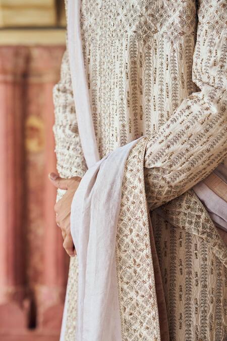 Nitika Gujral Pink Silk Crystals, Beads, Diamonds Embroidered Sherwani And Kurta Set Online at Aza Fashions Nitika Gujral_Pink Silk Crystals, Beads, Diamonds Embroidered Sherwani And Kurta Set _Online_at_Aza_Fashions