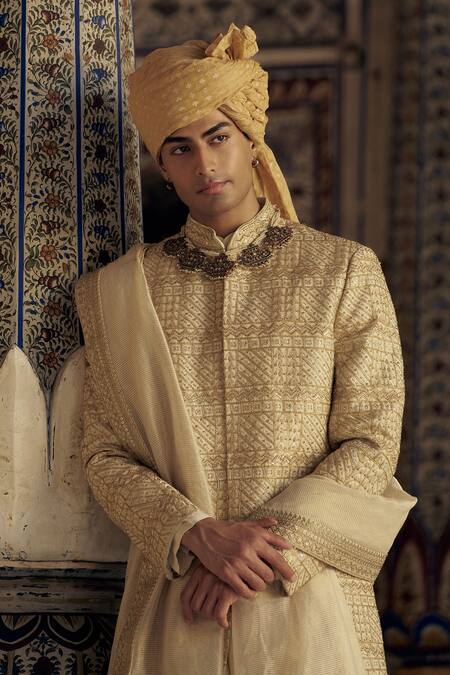 Shop_Nitika Gujral_Gold Silk Crystals, Beads, Geometric Pattern Embroidered Sherwani And Choga Set_Online_at_Aza_Fashions