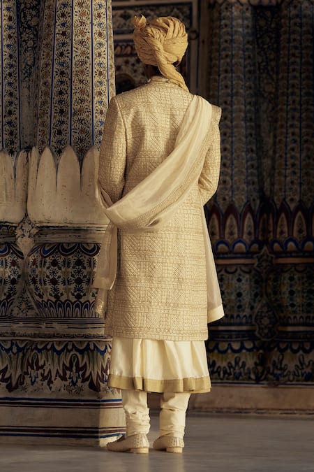 Shop Nitika Gujral Gold Silk Crystals, Beads, Diamonds, Metallic Embroidered Sherwani And Choga Set at Aza Fashions Shop_Nitika Gujral_Gold Silk Crystals, Beads, Diamonds, Metallic Embroidered Sherwani And Choga Set _at_Aza_Fashions