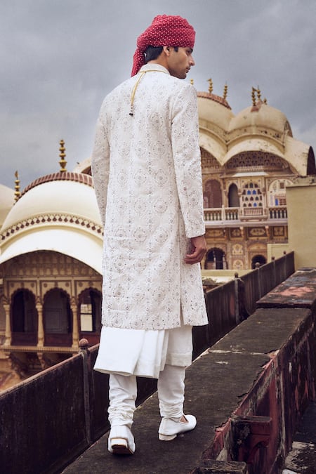 Shop Nitika Gujral Ivory Silk Sequins, Beads, Embroidery Geometric Pattern Sherwani And Choga Set at Aza Fashions Shop_Nitika Gujral_Ivory Silk Sequins, Beads, Embroidery Geometric Pattern Sherwani And Choga Set _at_Aza_Fashions