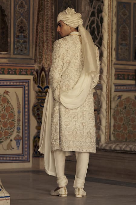 Shop Nitika Gujral Ivory Silk Embroidery Flowery Sherwani And Choga Set at Aza Fashions Shop_Nitika Gujral_Ivory Silk Embroidery Flowery Sherwani And Choga Set _at_Aza_Fashions
