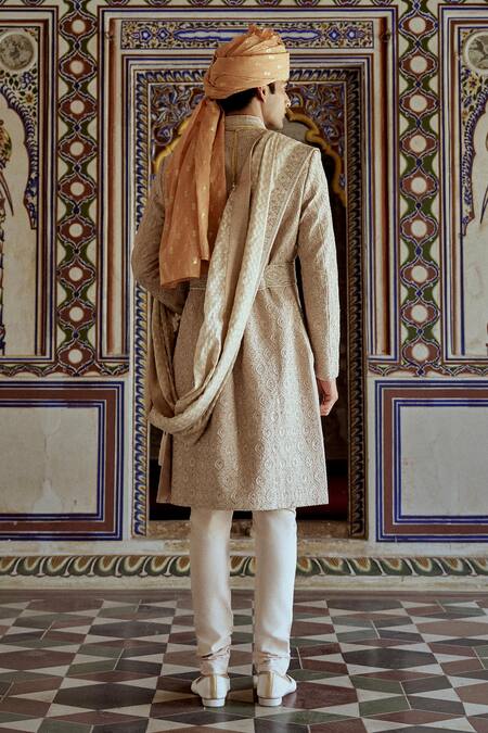 Shop Nitika Gujral Beige Silk Cut Work, Embroidery, Crystals Resham Dabka Sherwani Set at Aza Fashions Shop_Nitika Gujral_Beige Silk Cut Work, Embroidery, Crystals Resham Dabka Sherwani Set_at_Aza_Fashions