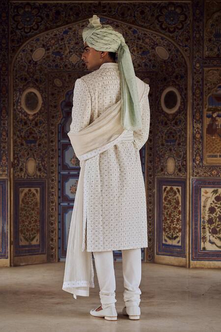 Shop Nitika Gujral Ivory Embroidery Geometric Sherwani Set With Belt at Aza Fashions Shop_Nitika Gujral_Ivory Embroidery Geometric Sherwani Set With Belt_at_Aza_Fashions