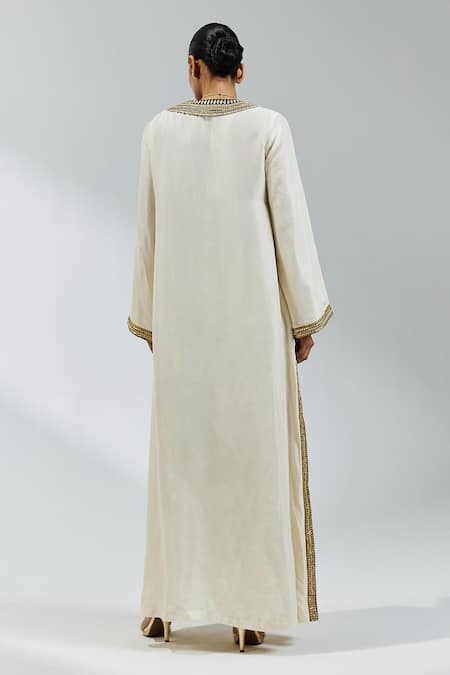 Shop Priyal Prakash Ivory Silk Sequins, Gota Patti V-neck Lace Placket Embroidered Kaftan at Aza Fashions Shop_Priyal Prakash_Ivory Silk Sequins, Gota Patti V-neck Lace Placket Embroidered Kaftan _at_Aza_Fashions
