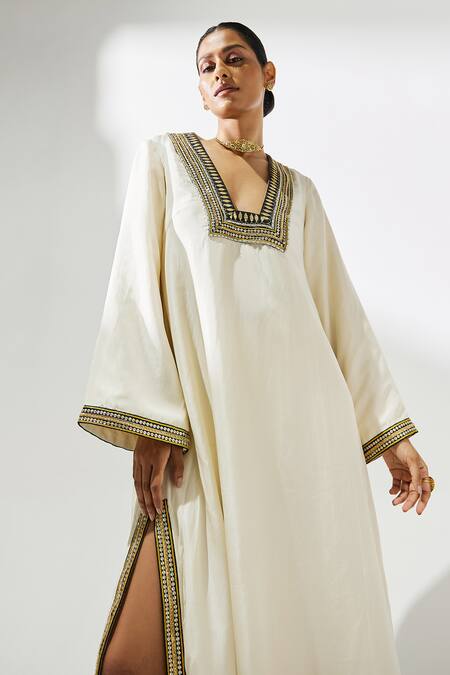 Priyal Prakash Ivory Silk Sequins, Gota Patti V-neck Lace Placket Embroidered Kaftan at Aza Fashions Priyal Prakash_Ivory Silk Sequins, Gota Patti V-neck Lace Placket Embroidered Kaftan _at_Aza_Fashions