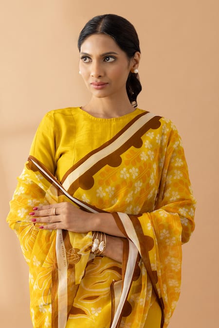 Shop Thee Modern Roots Yellow Chiffon Floral Petal Print Saree at Aza Fashions Shop_Thee Modern Roots_Yellow Chiffon Floral Petal Print Saree _at_Aza_Fashions