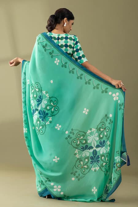 Shop Thee Modern Roots Green Crepe Sequins, Pearls Flower Vine Print Saree at Aza Fashions Shop_Thee Modern Roots_Green Crepe Sequins, Pearls Flower Vine Print Saree _at_Aza_Fashions